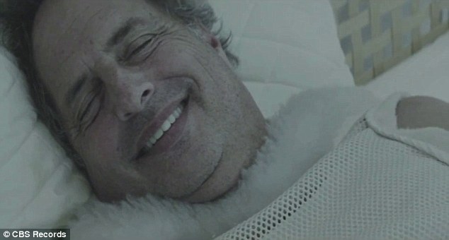 Sweet dreams: Jon is then shown laying with a smile on his face