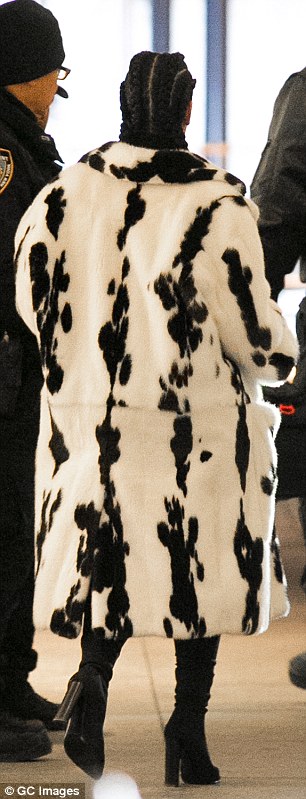 Wild about fashion! Kim wore sky high heels for her day out