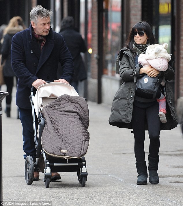 Strolling with the stroller: The family was seen all bundled up as they headed out for a walk last Thursday in New York