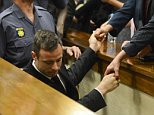 BY COURT ORDER, THIS IMAGE IS FREE TO USE.  PRETORIA, SOUTH AFRICA - OCTOBER 21 (SOUTH AFRICA OUT): Oscar Pistorius leaves the Pretoria High Court after he is sentenced on October 21, 2014, in Pretoria, South Africa. Judge Thokozile Masipa handed down her sentence today in the Oscar Pistorius murder trial. Pistorius was sentenced to five years in prison. (Photo by Herman Verwey/Foto24/Gallo Images/Getty Images)