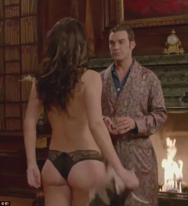 Pert: The 49-year-old, who turns 50 in June, looks sensational in just a pair of lace knickers