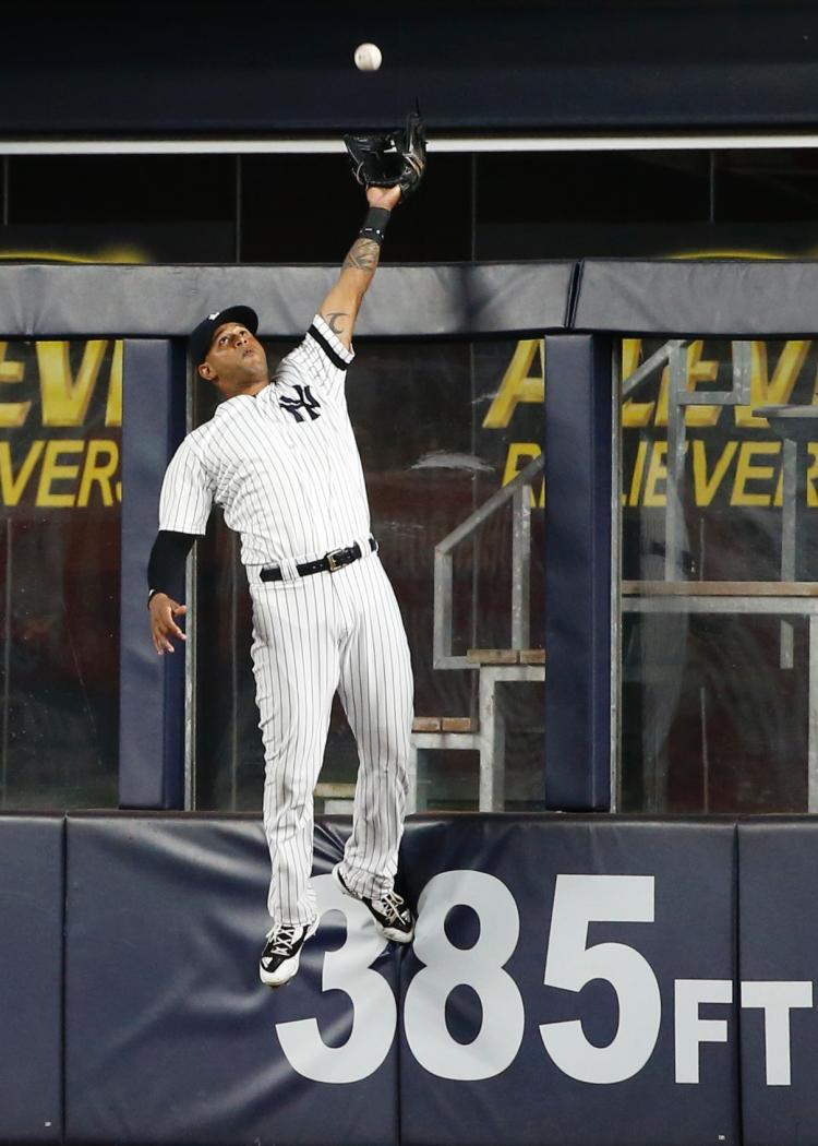 Aaron Hicks makes an impressive grab.