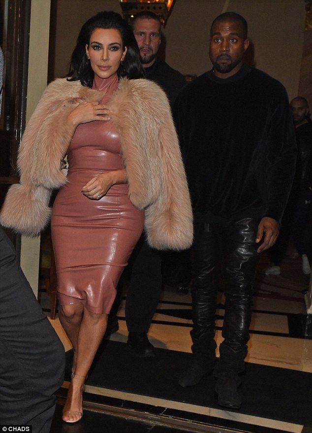 Date night: Kim and husband Kanye West left the Dorchester Hotel together as they made their way to dinner