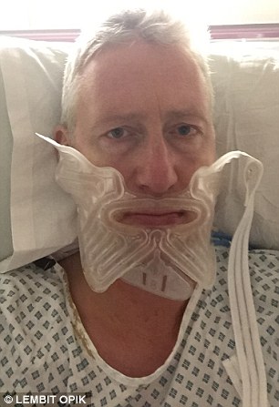 Pictured, Lembit Opik shortly after the first of a series of life-changing operations on his jaw
