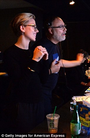 Getting involved: Scarlett thoroughly embraced the new challenge and offered the sound guy some pointers